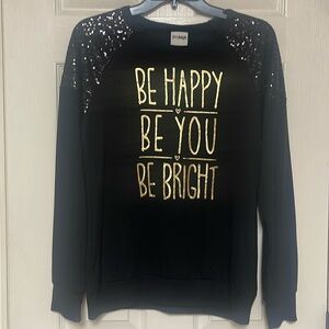 Jerryleigh size medium top. Black with sequins on the shoulders. Great condition